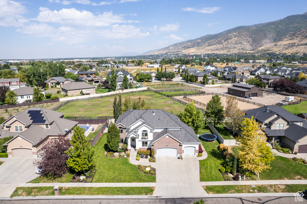 Birds eye view of property featuring a mountain view