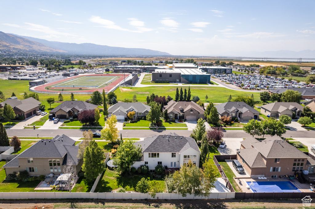 Birds eye view of property with a mountain view