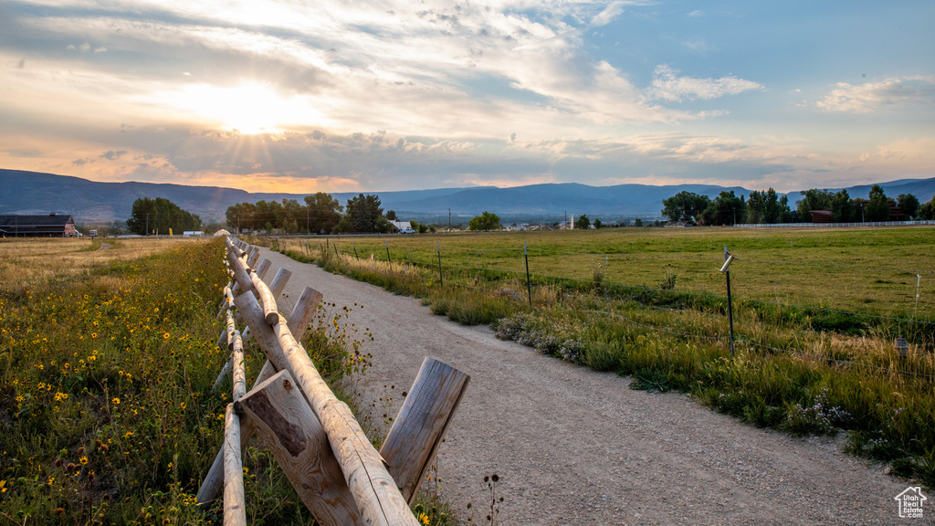 View of road featuring a mountain view and a rural view