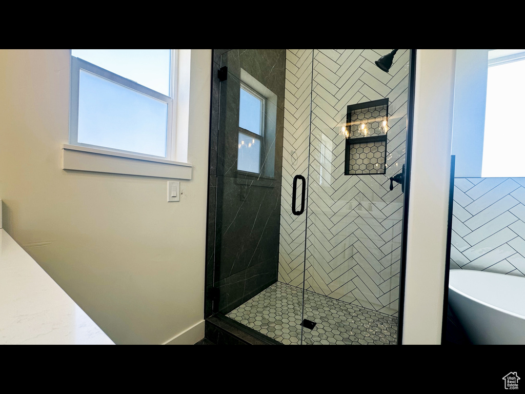 Bathroom with plus walk in shower and vanity