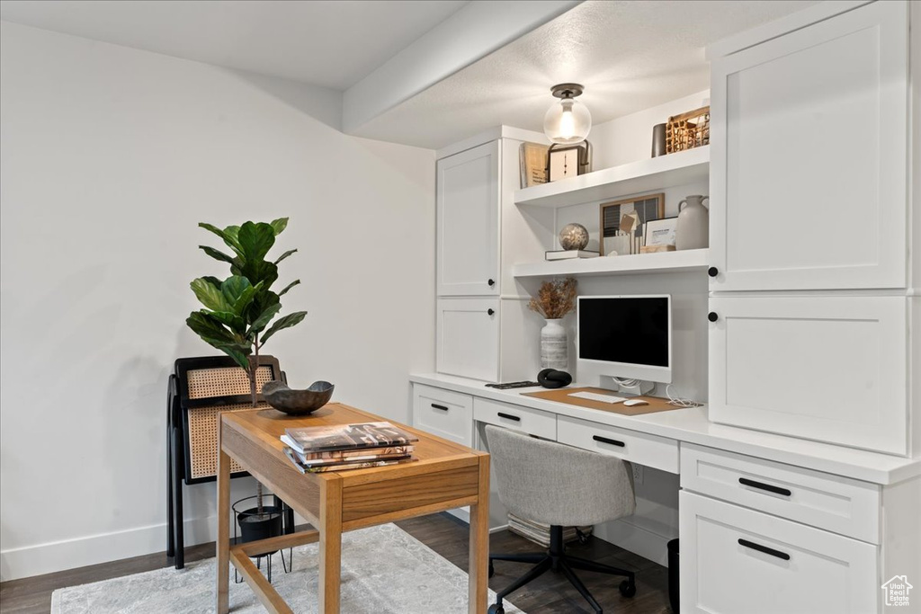 Office space featuring dark hardwood / wood-style floors