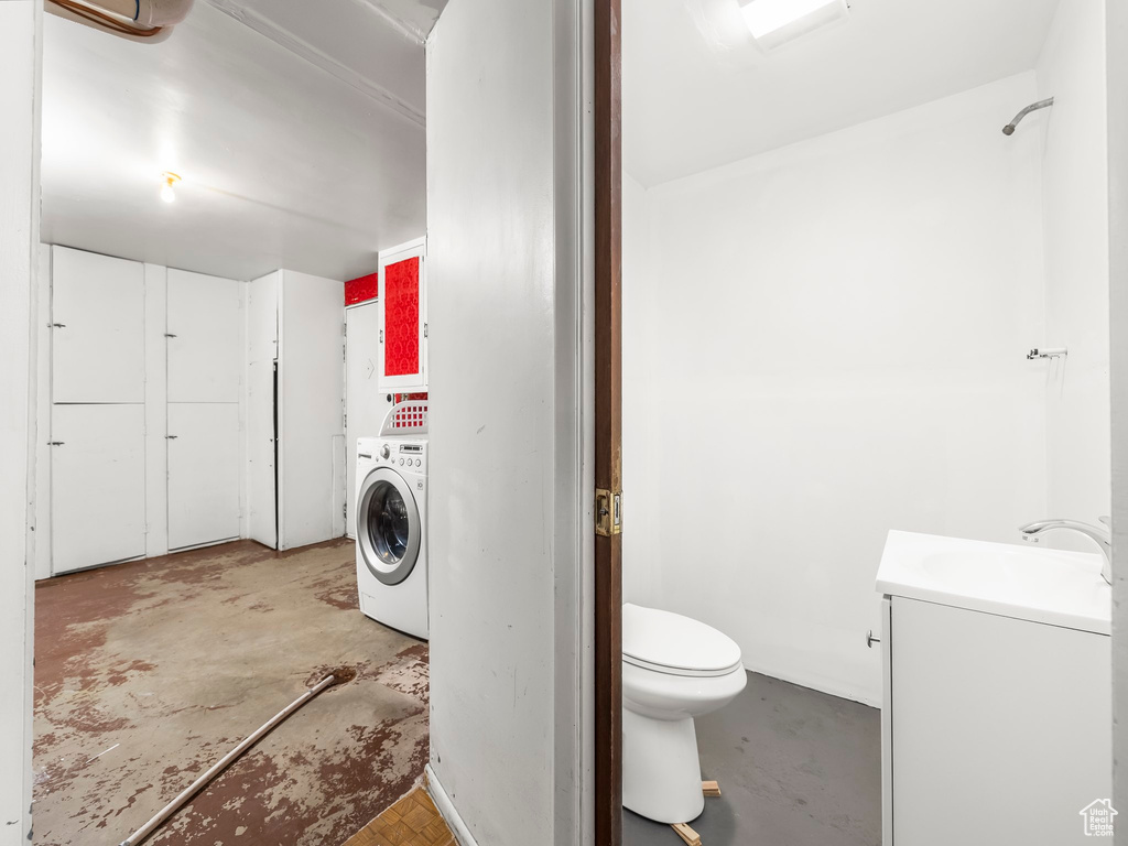 Washroom with washer / dryer and sink