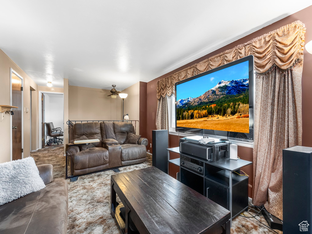 Living room featuring ceiling fan