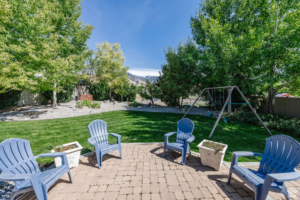 View of patio with a mountain view