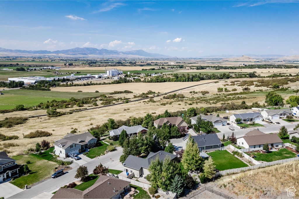 Birds eye view of property with a mountain view