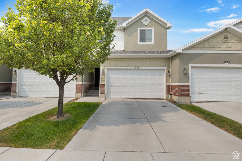 View of front of house with a garage