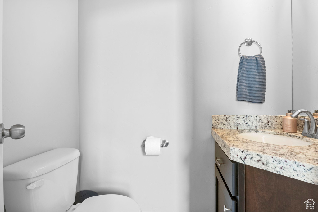 Bathroom with vanity and toilet