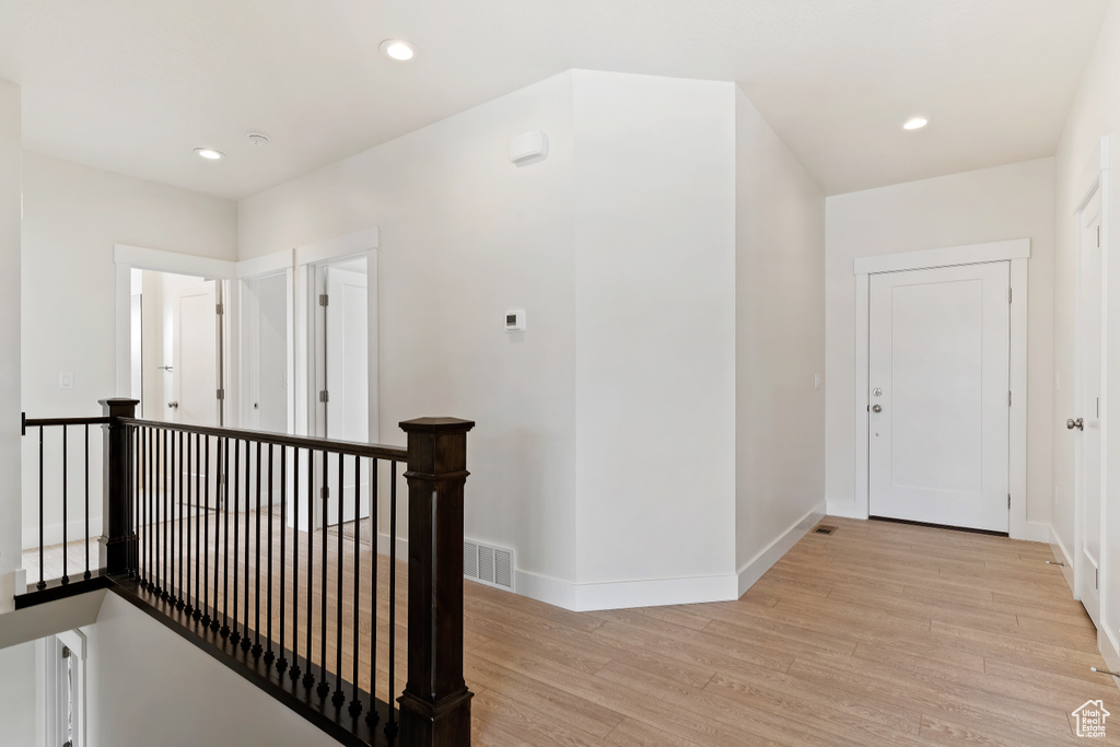 Hallway featuring light hardwood / wood-style floors