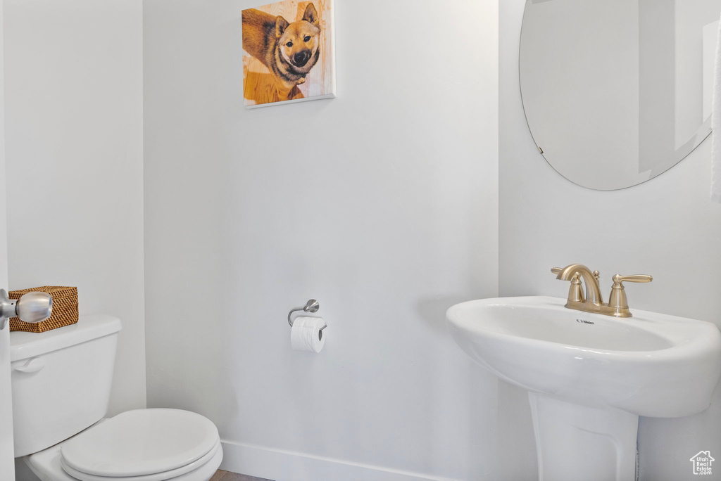 Bathroom featuring toilet and sink