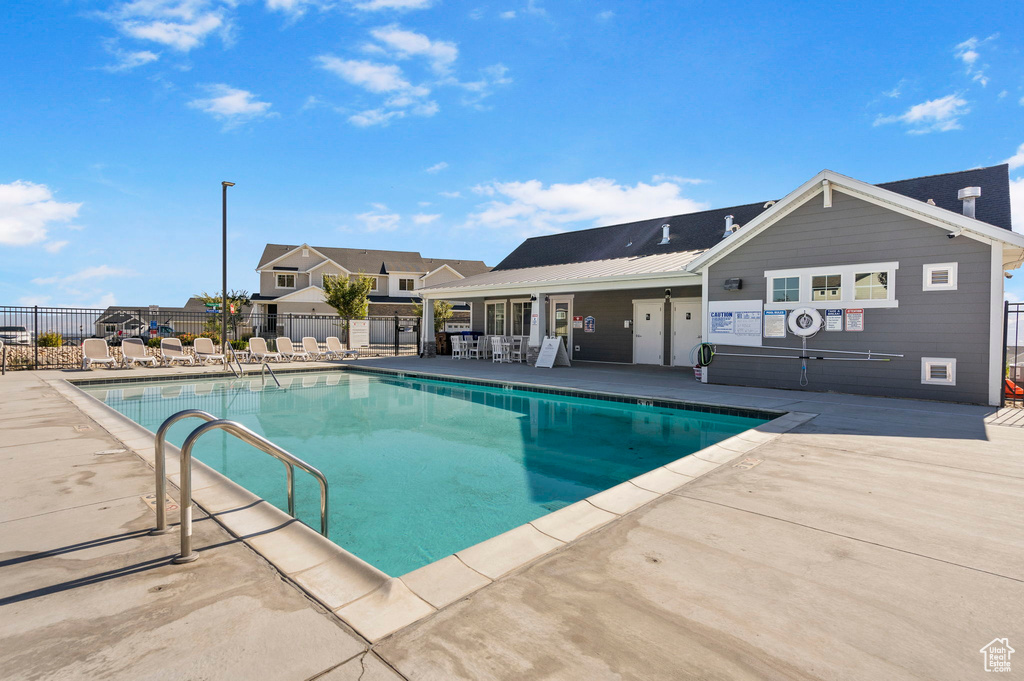 View of swimming pool featuring a patio