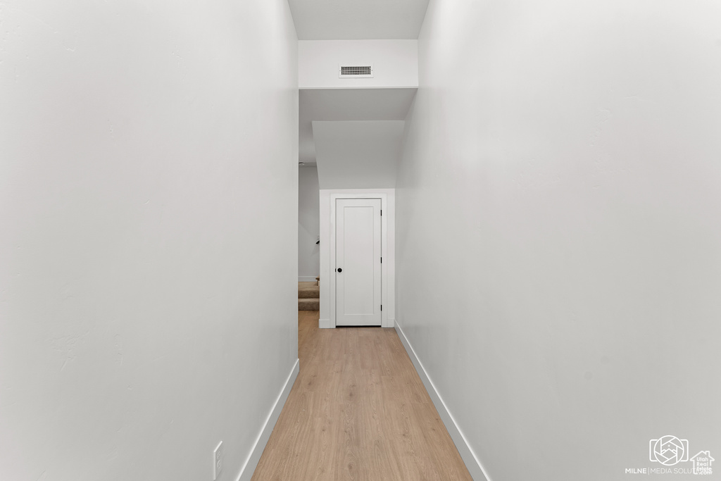 Hallway featuring light hardwood / wood-style floors