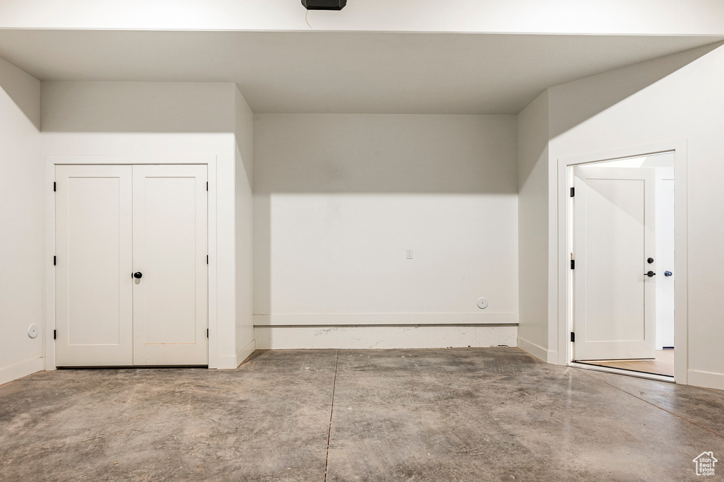 Bonus room with concrete flooring