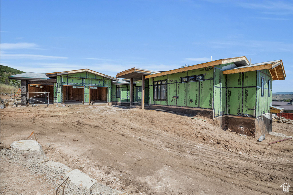 Exterior space featuring an outbuilding