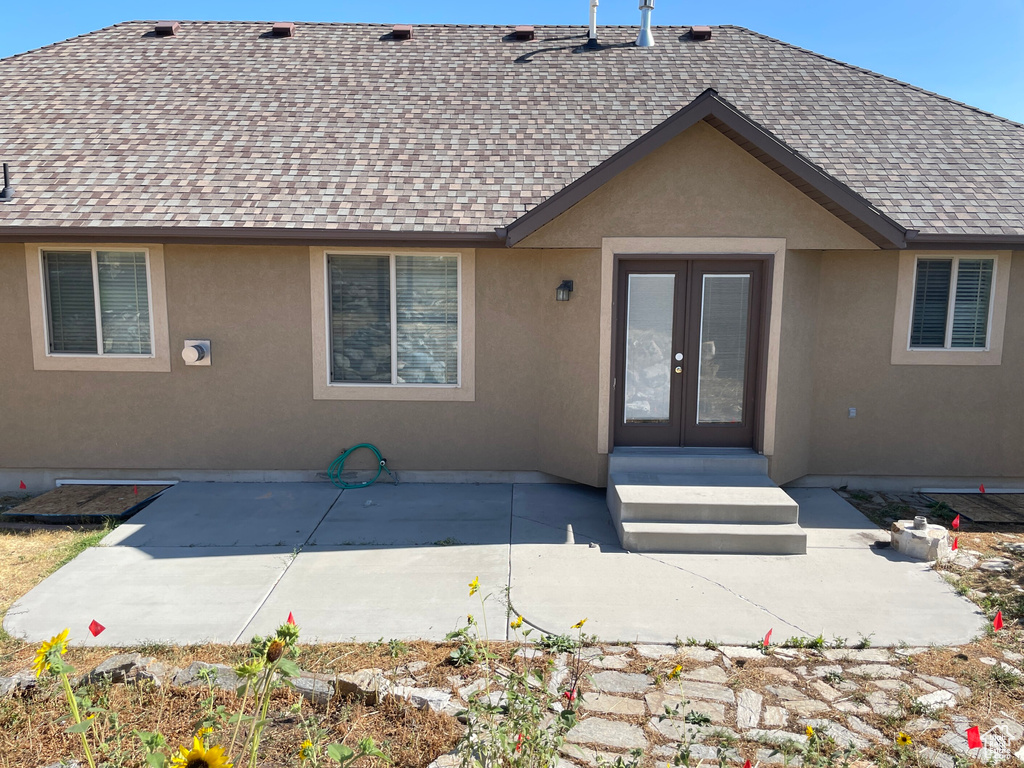 Exterior space featuring a patio and french doors