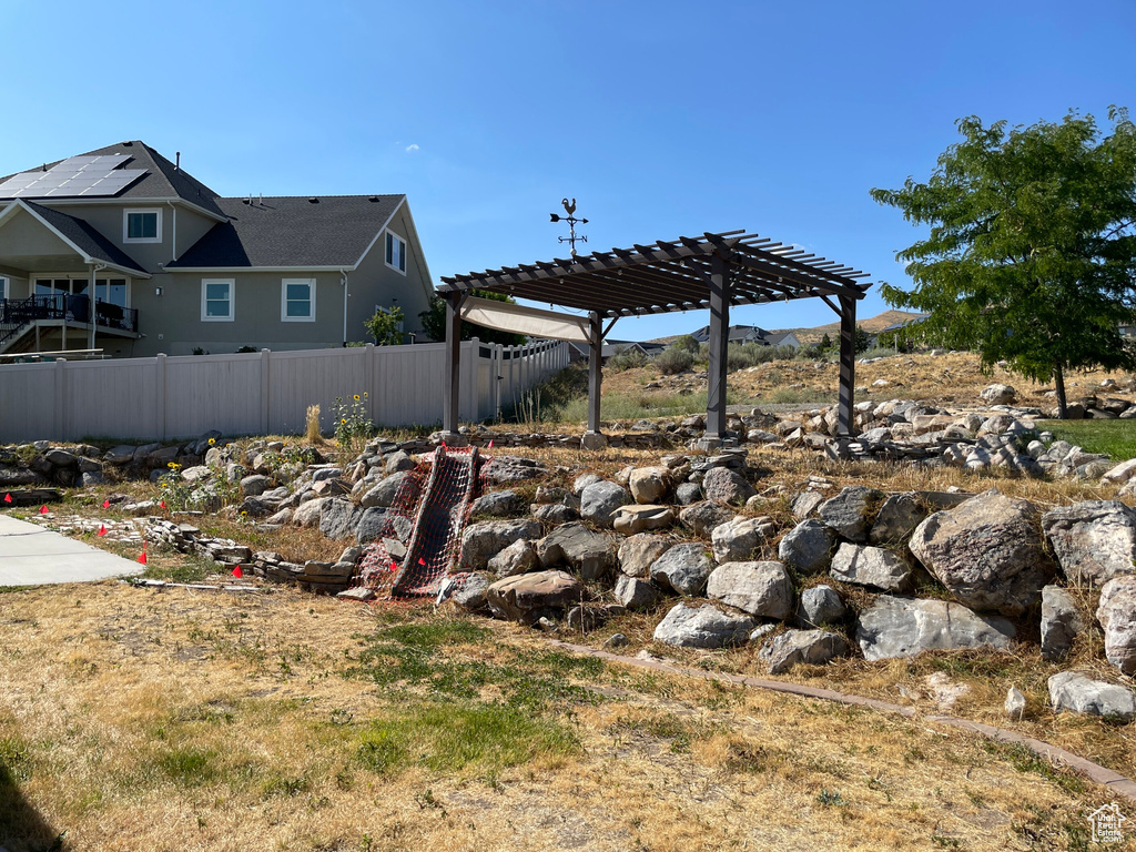 View of yard featuring a pergola