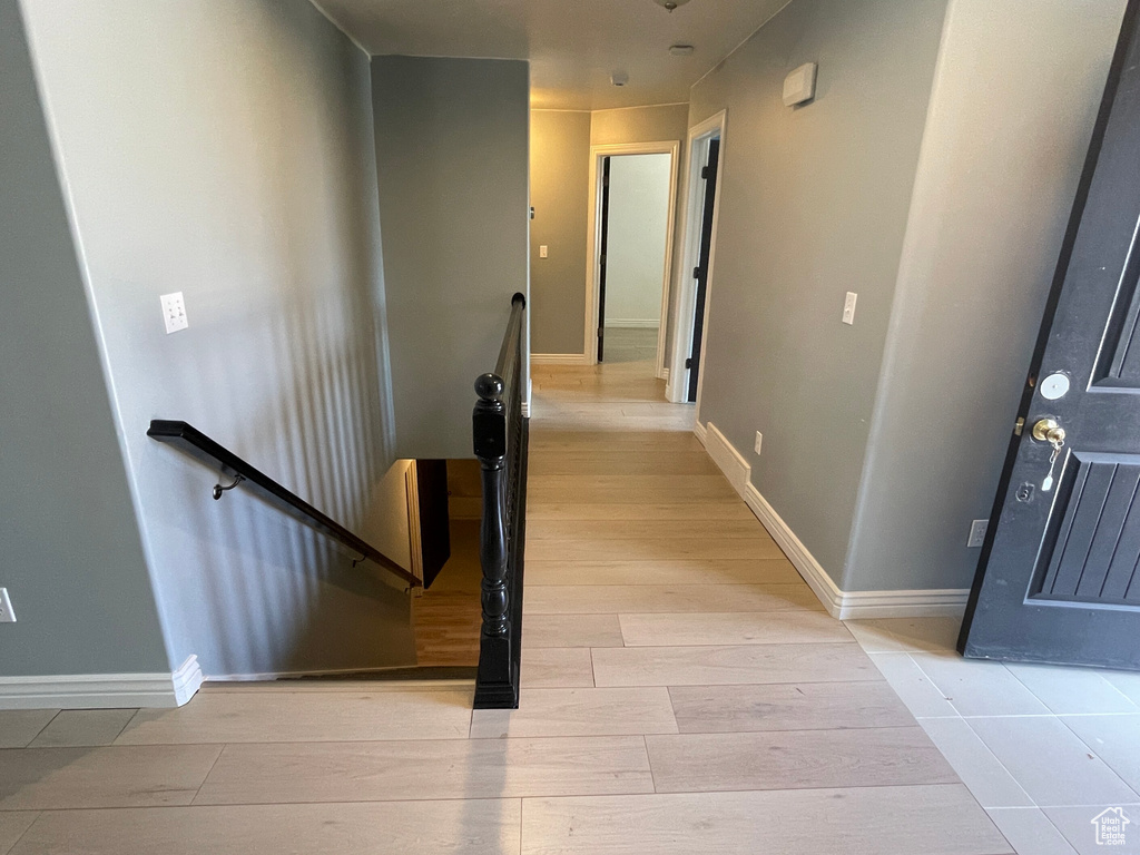 Hall featuring light hardwood / wood-style flooring