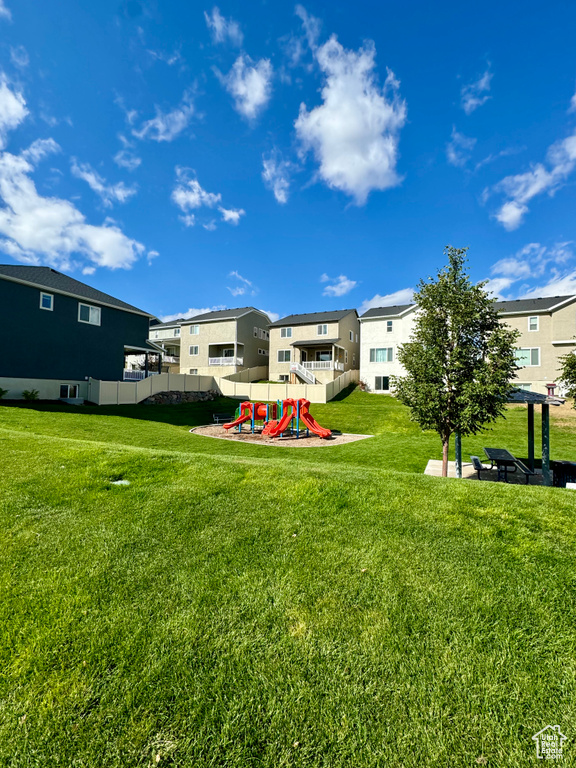 View of yard featuring a playground