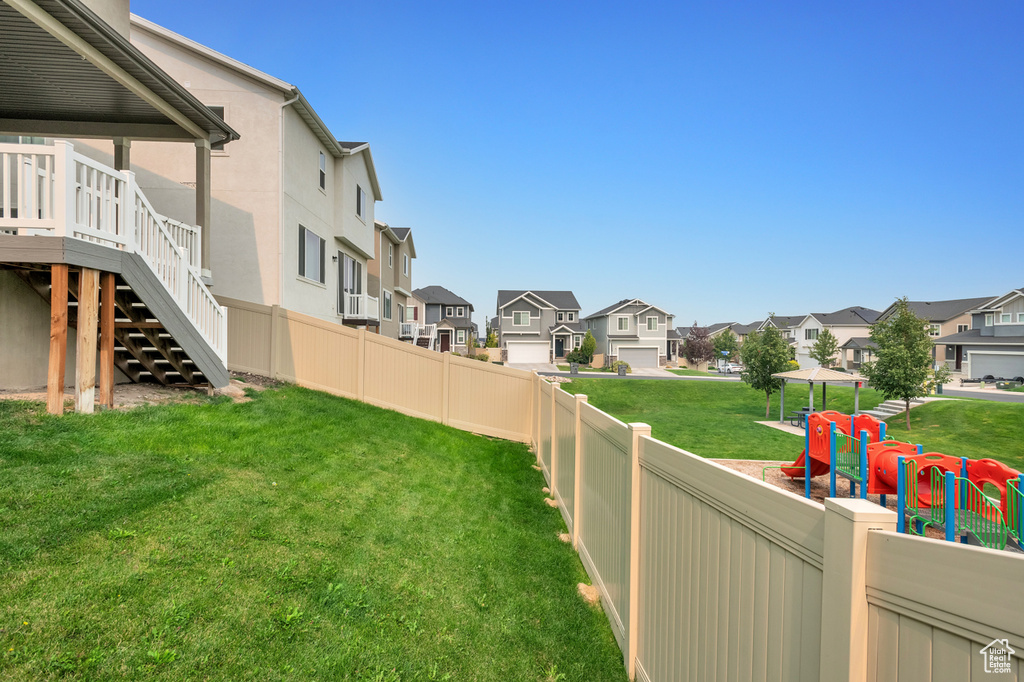 View of yard featuring a garage