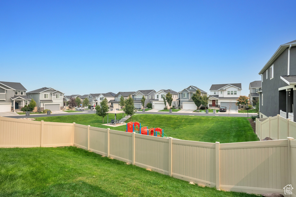 View of yard featuring a garage