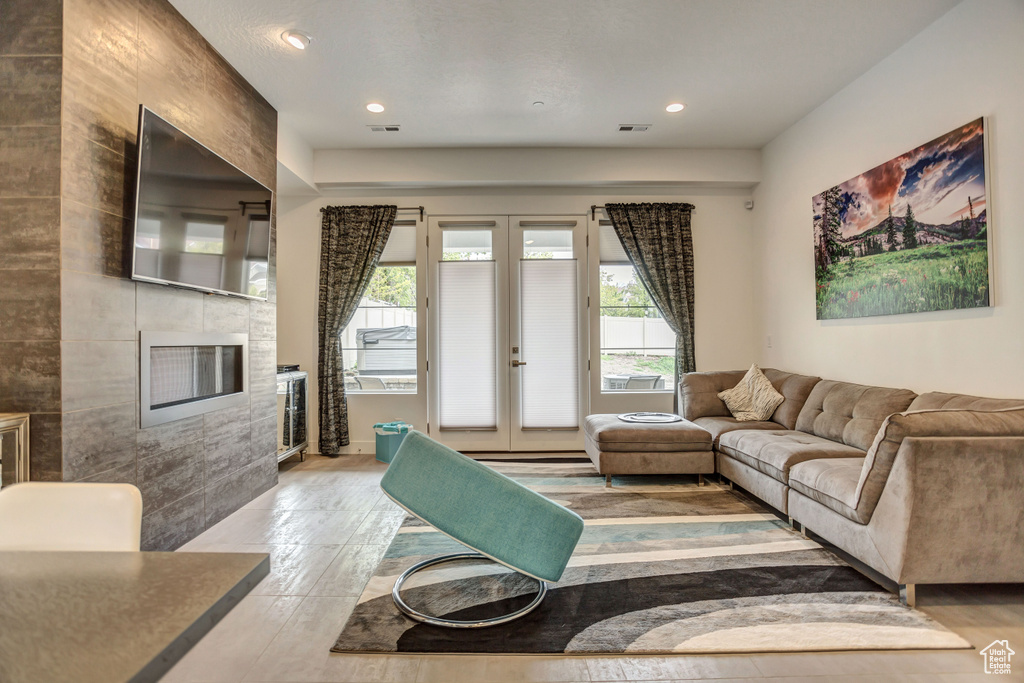 Living room featuring hardwood / wood-style floors and french doors