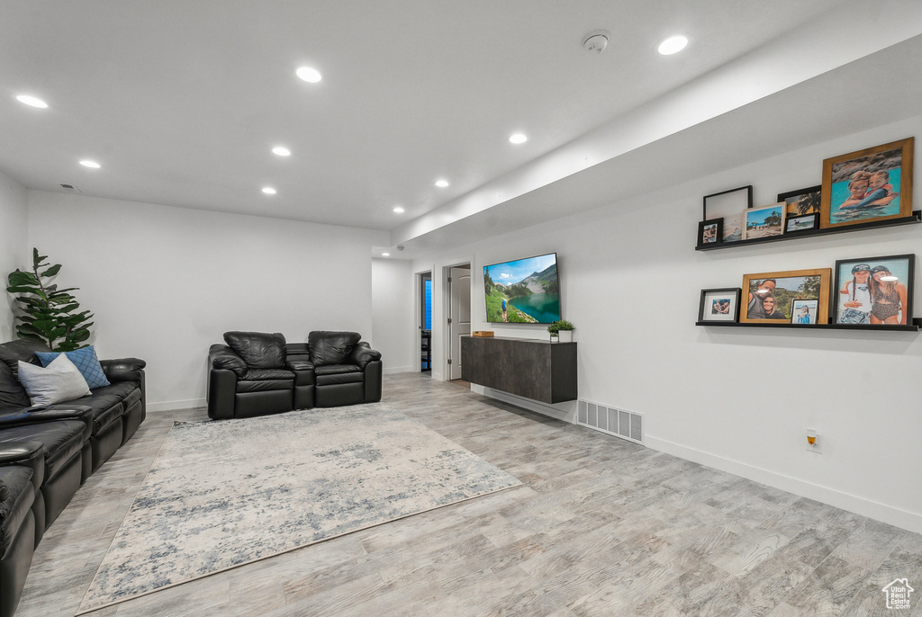 Living room featuring light hardwood / wood-style flooring