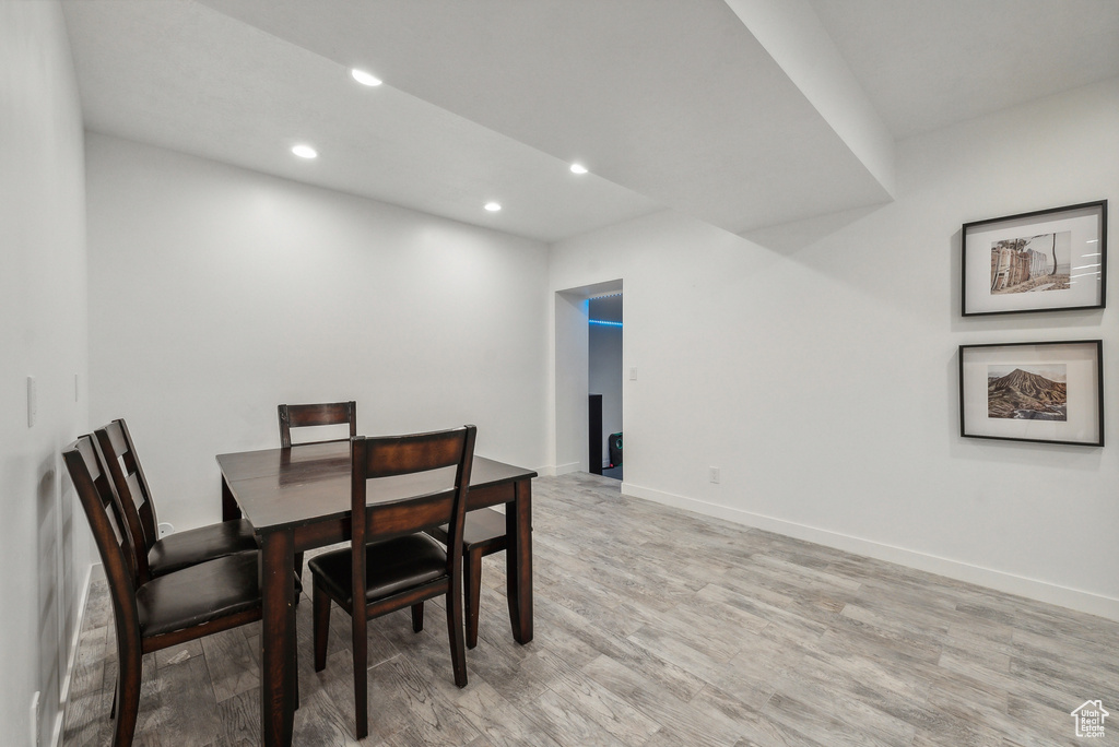 Dining room with light hardwood / wood-style floors