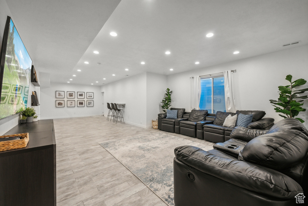 Living room with light wood-type flooring