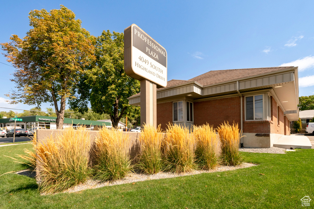 Exterior space with a lawn