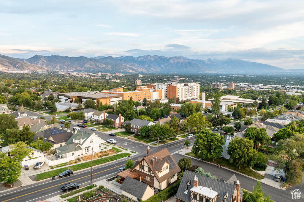 Birds eye view of property with a mountain view