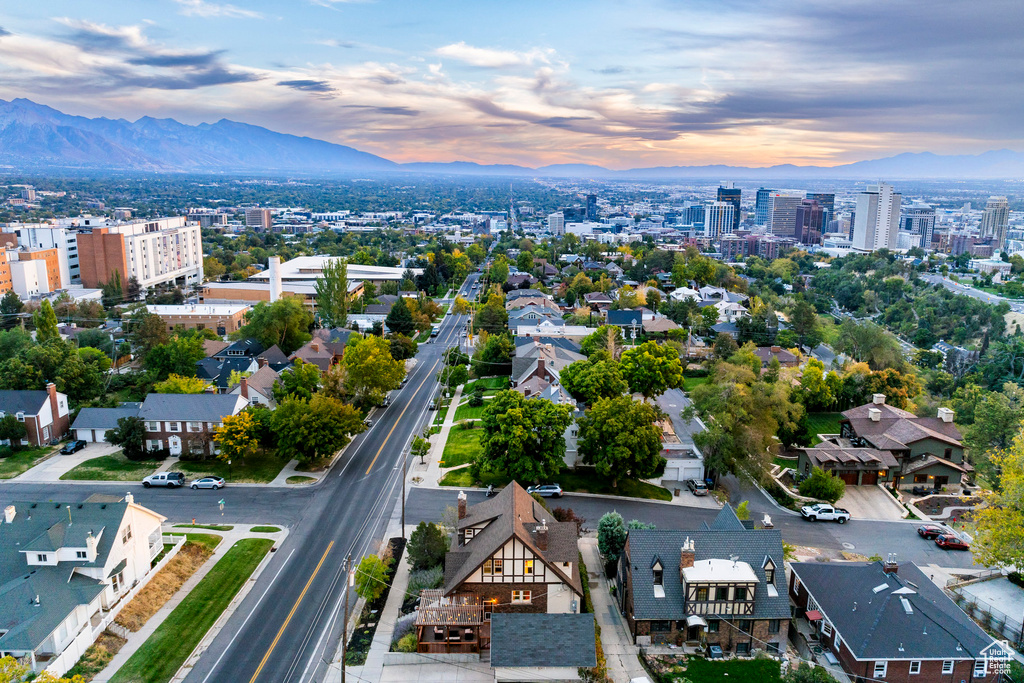 Aerial view at dusk featuring a mountain view