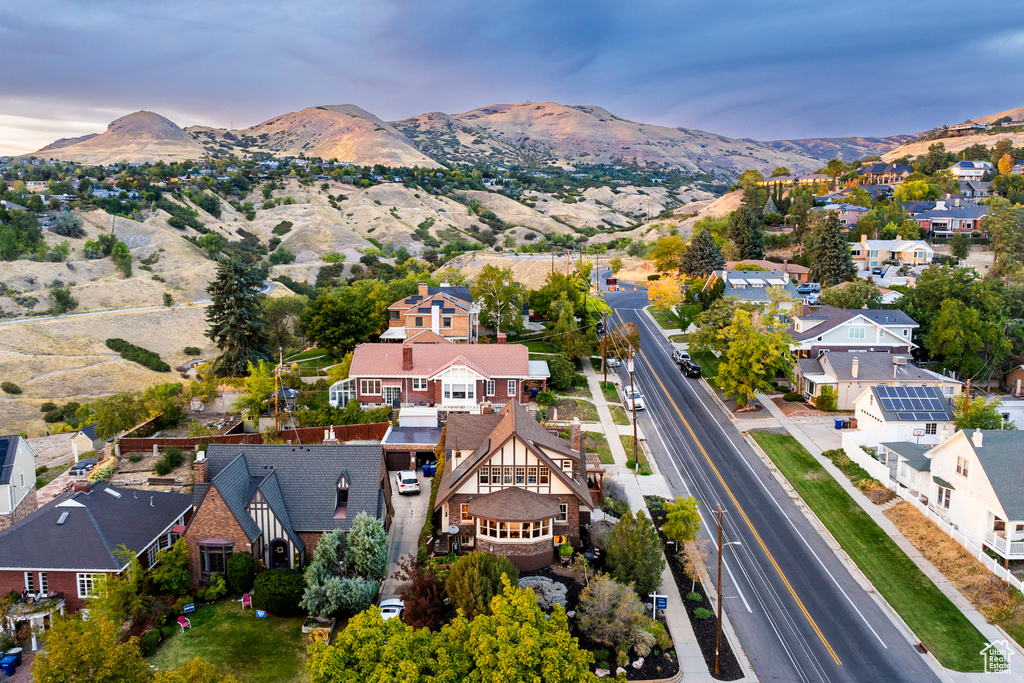 Aerial view at dusk featuring a mountain view