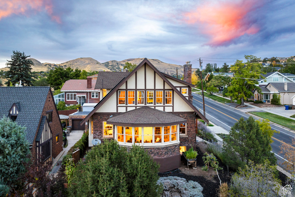 Back house at dusk with a mountain view