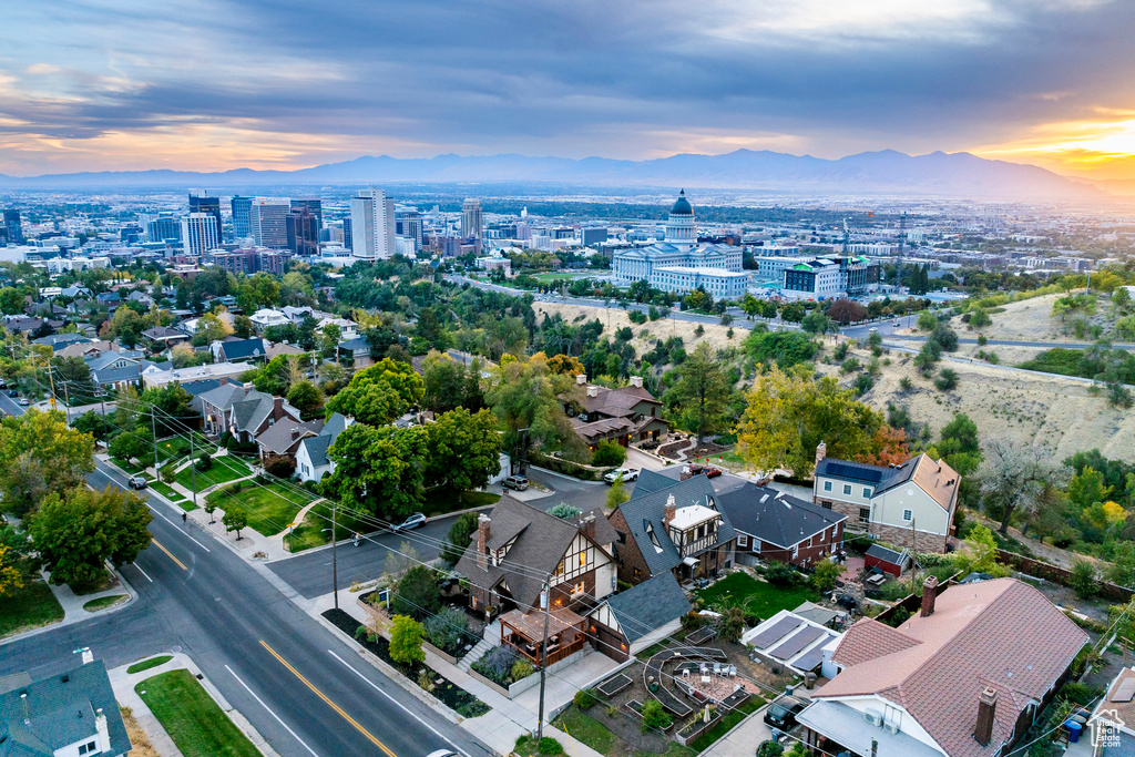 Aerial view at dusk featuring a mountain view