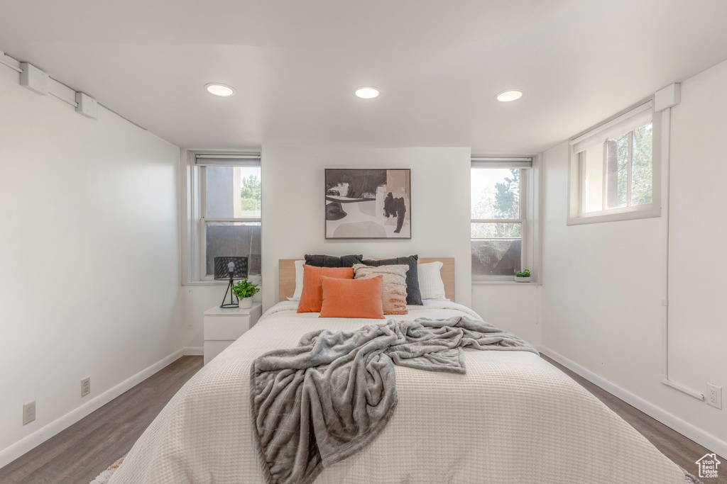 Bedroom featuring dark wood-type flooring