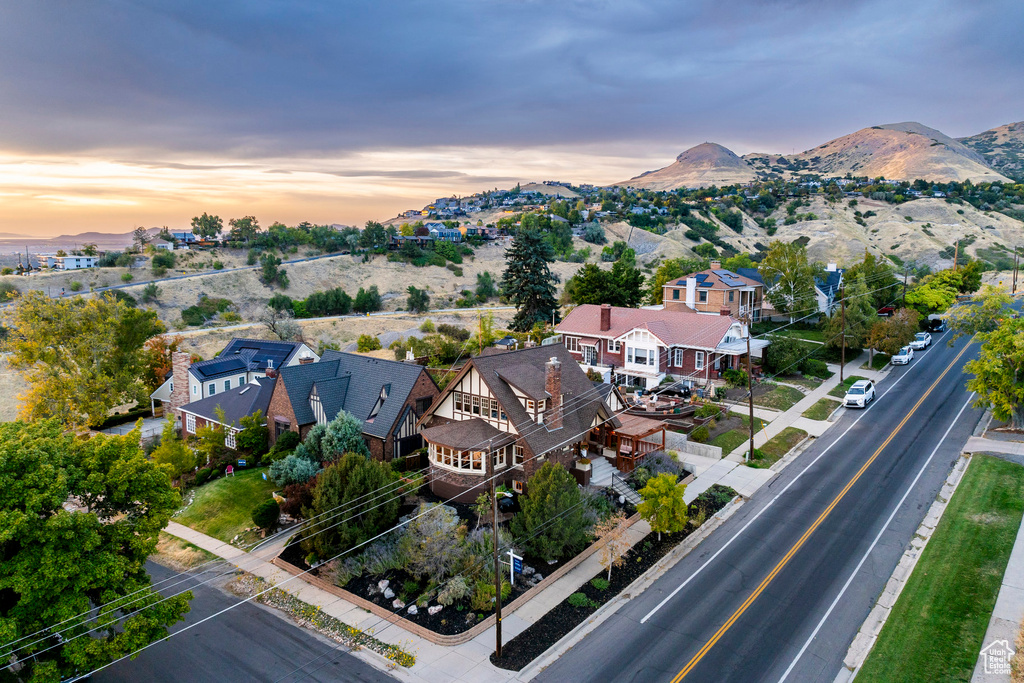 Aerial view at dusk featuring a mountain view