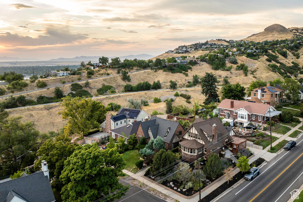 Aerial view at dusk featuring a mountain view