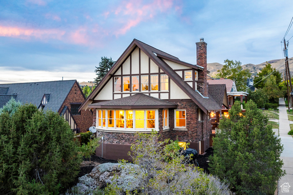 Back house at dusk with a mountain view