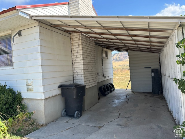 Exterior space with a carport