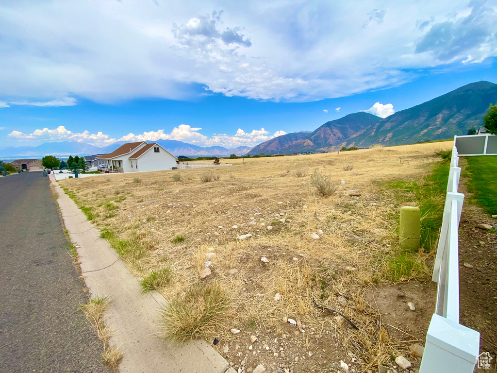 Property view of mountains featuring a rural view