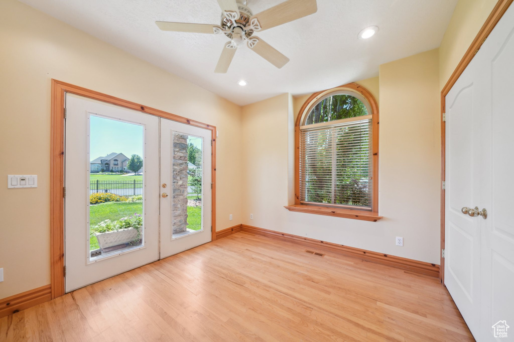 Interior space with light wood-type flooring and ceiling fan