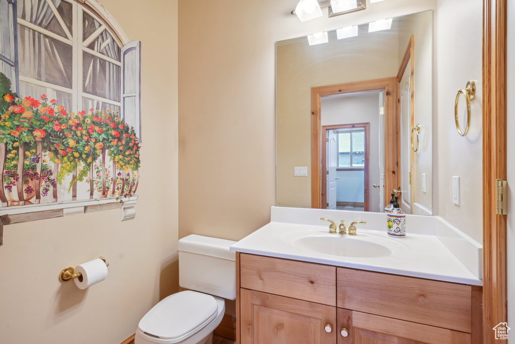 Bathroom with vanity and toilet