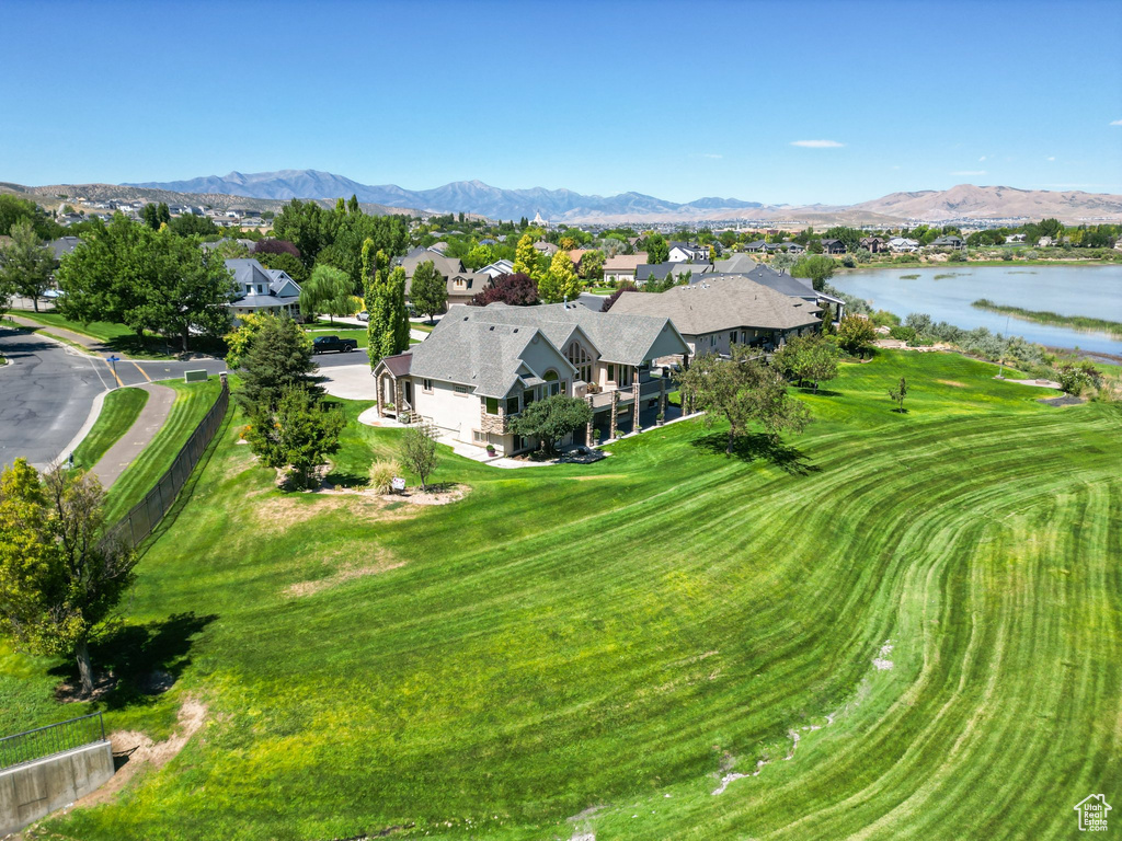 Aerial view featuring a water and mountain view