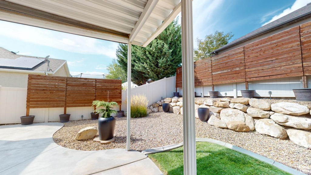 View of yard with a patio