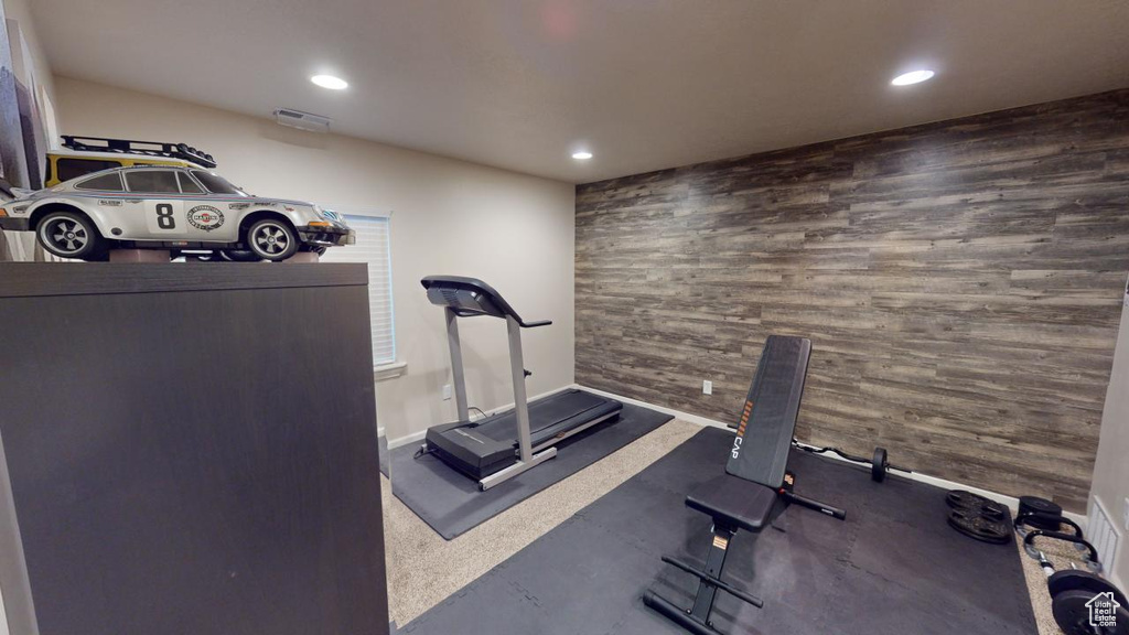 Workout area with tile walls