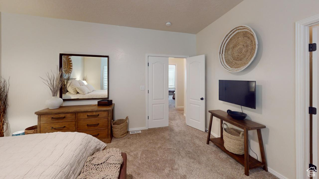 View of carpeted bedroom