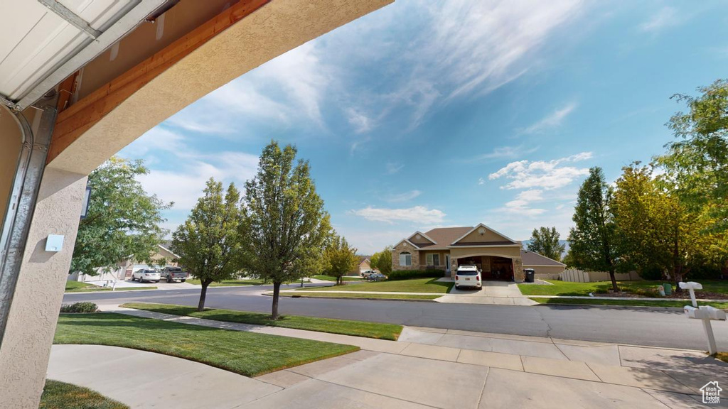 View of yard with a garage