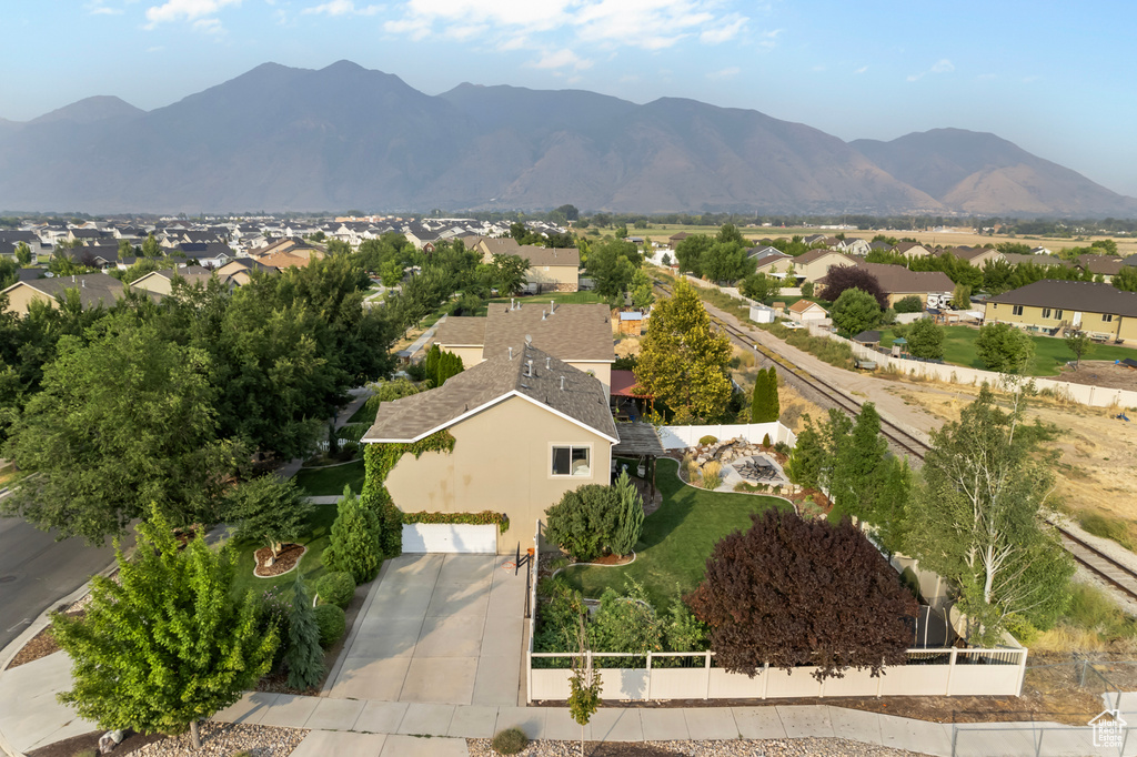 Birds eye view of property with a mountain view