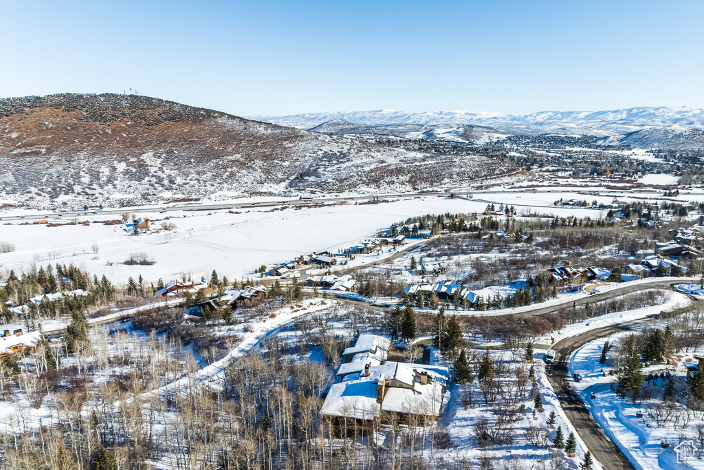 Snowy aerial view with a mountain view