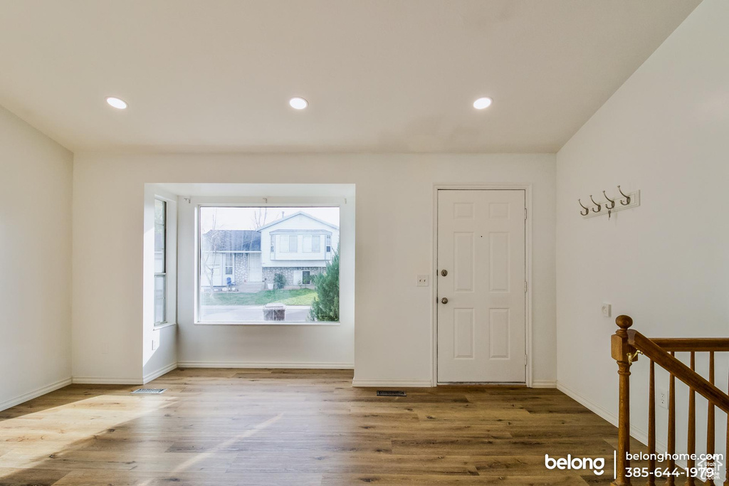 Entryway featuring hardwood / wood-style flooring