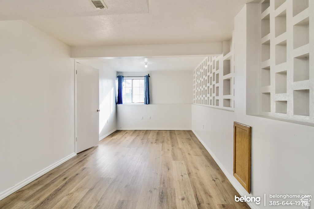 Spare room featuring light hardwood / wood-style floors